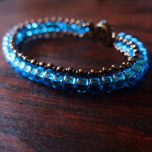 Temple Tree Boho Glass Bead Caterpillar Weave Bracelet - Aqua and Bronze