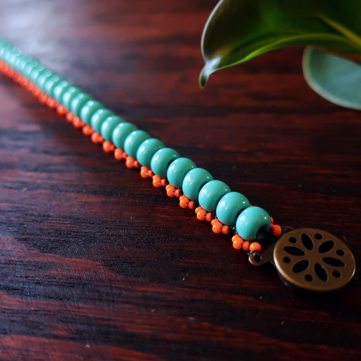 Temple Tree Boho Glass Bead Caterpillar Weave Bracelet - Aqua and Orange