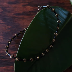 Temple Tree Curio Weave Beaded Bugle Bracelet - Black and Bronze