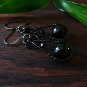Temple Tree Pendulum Dangle Spinner Earrings - Black