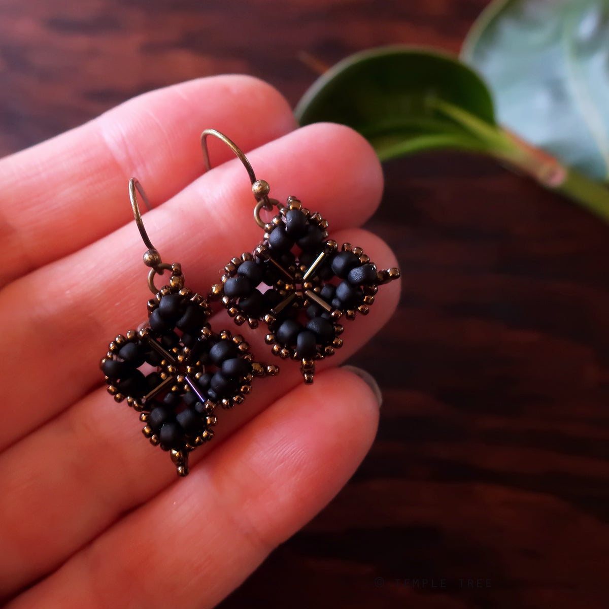 Temple Tree Quatrefoil Mandala Beaded Earrings - Matte Black and Bronze