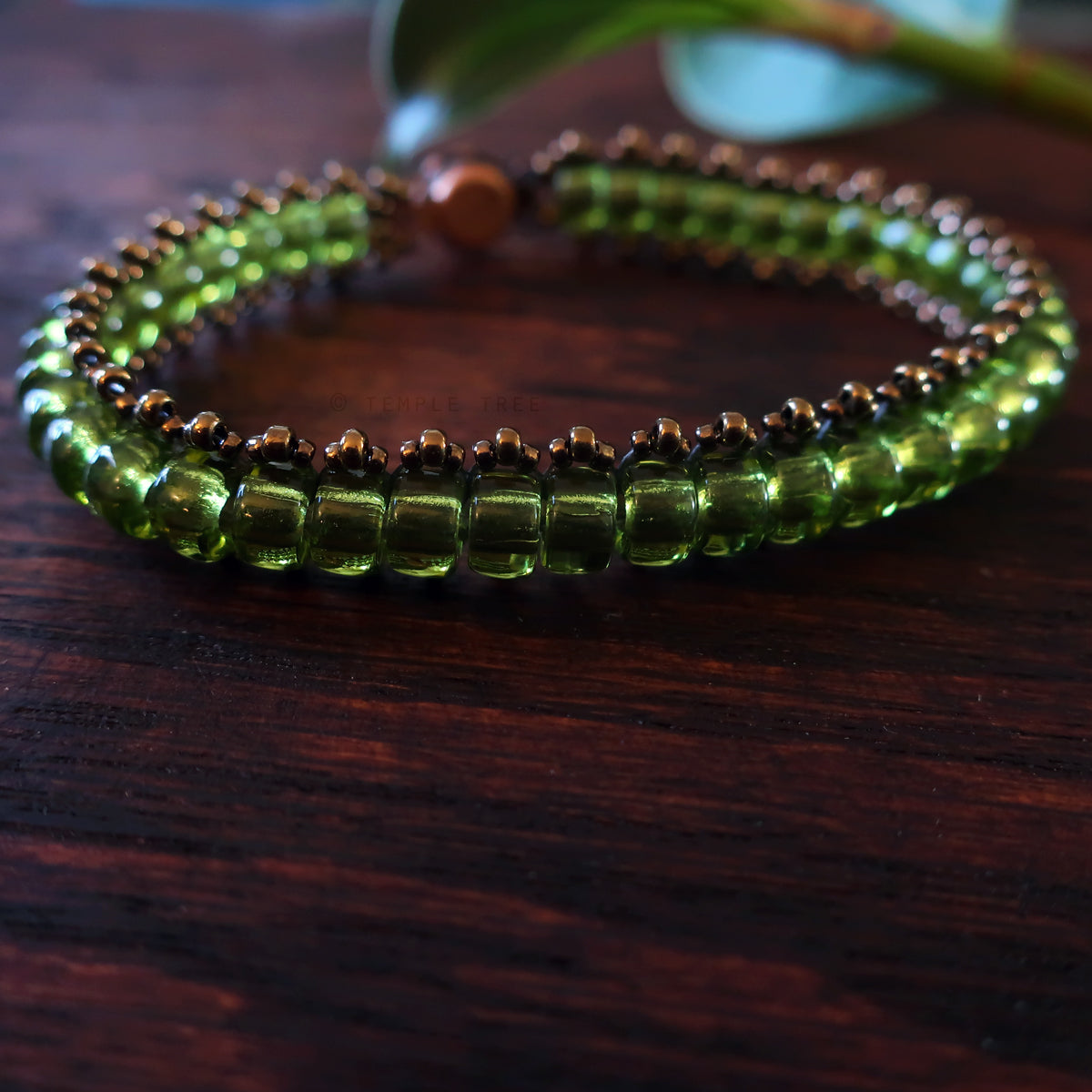 Temple Tree Boho Glass Bead Caterpillar Weave Bracelet - Peridot Green and Bronze