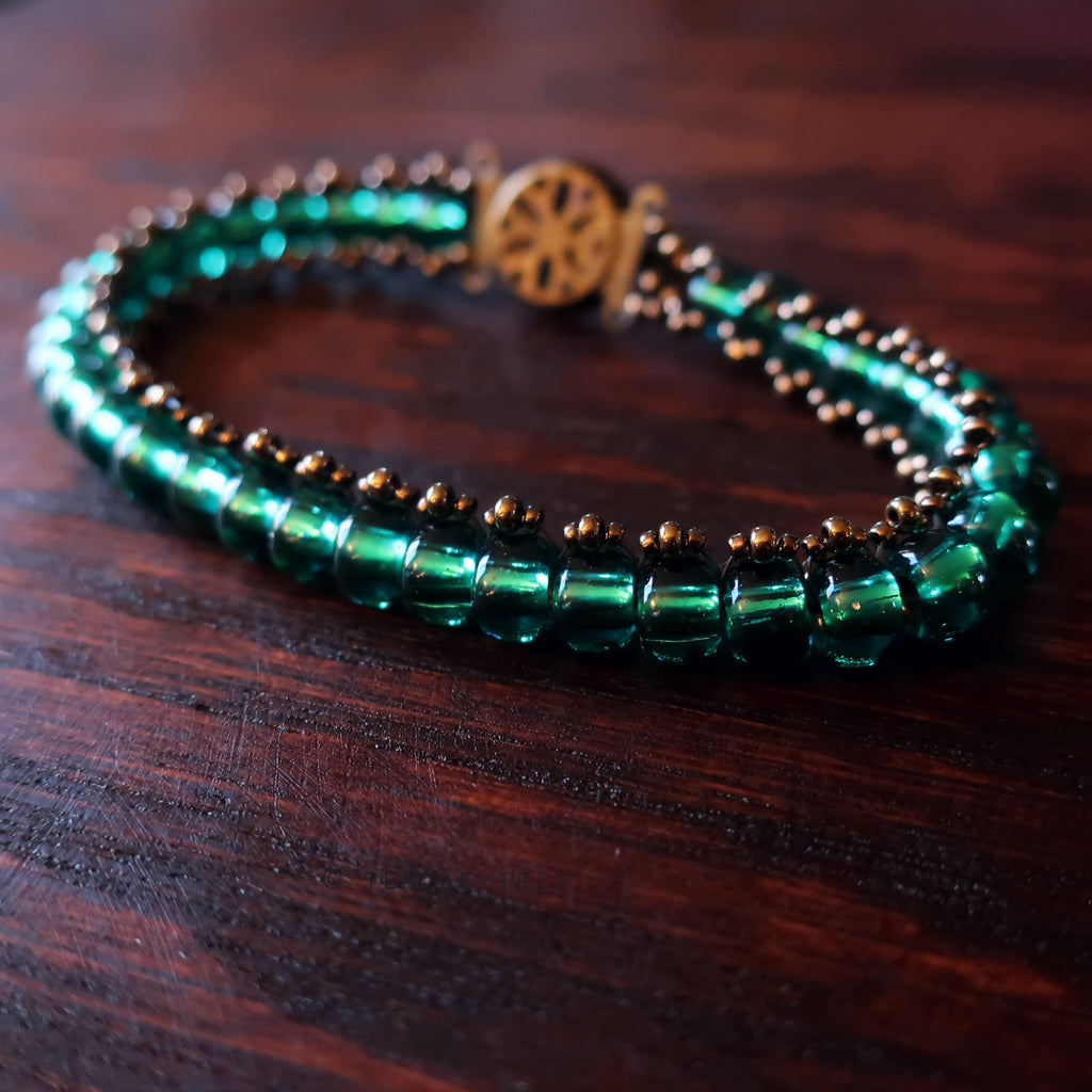 Temple Tree Boho Glass Bead Caterpillar Weave Bracelet -Sparkly Emerald and Bronze